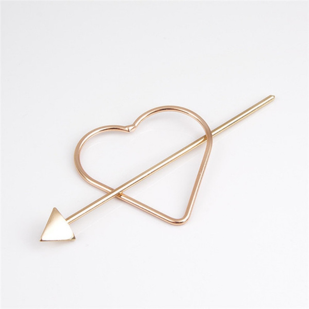 Gold cupids arrow hair accessory